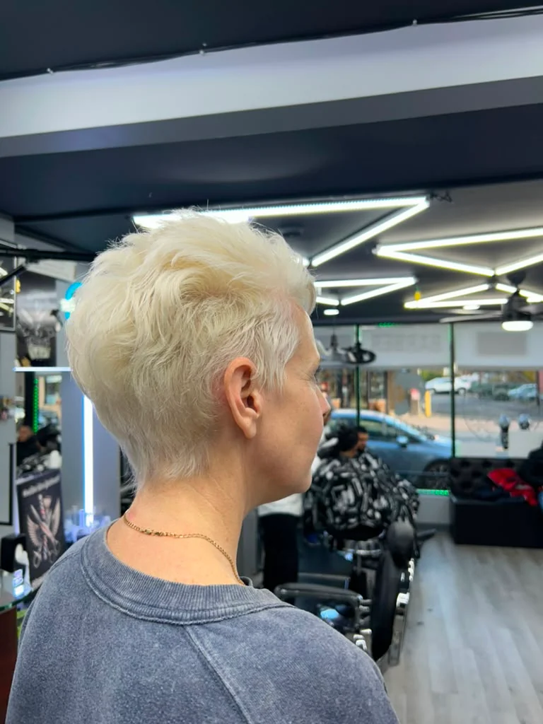 Platinum pixie cut with soft texture on top