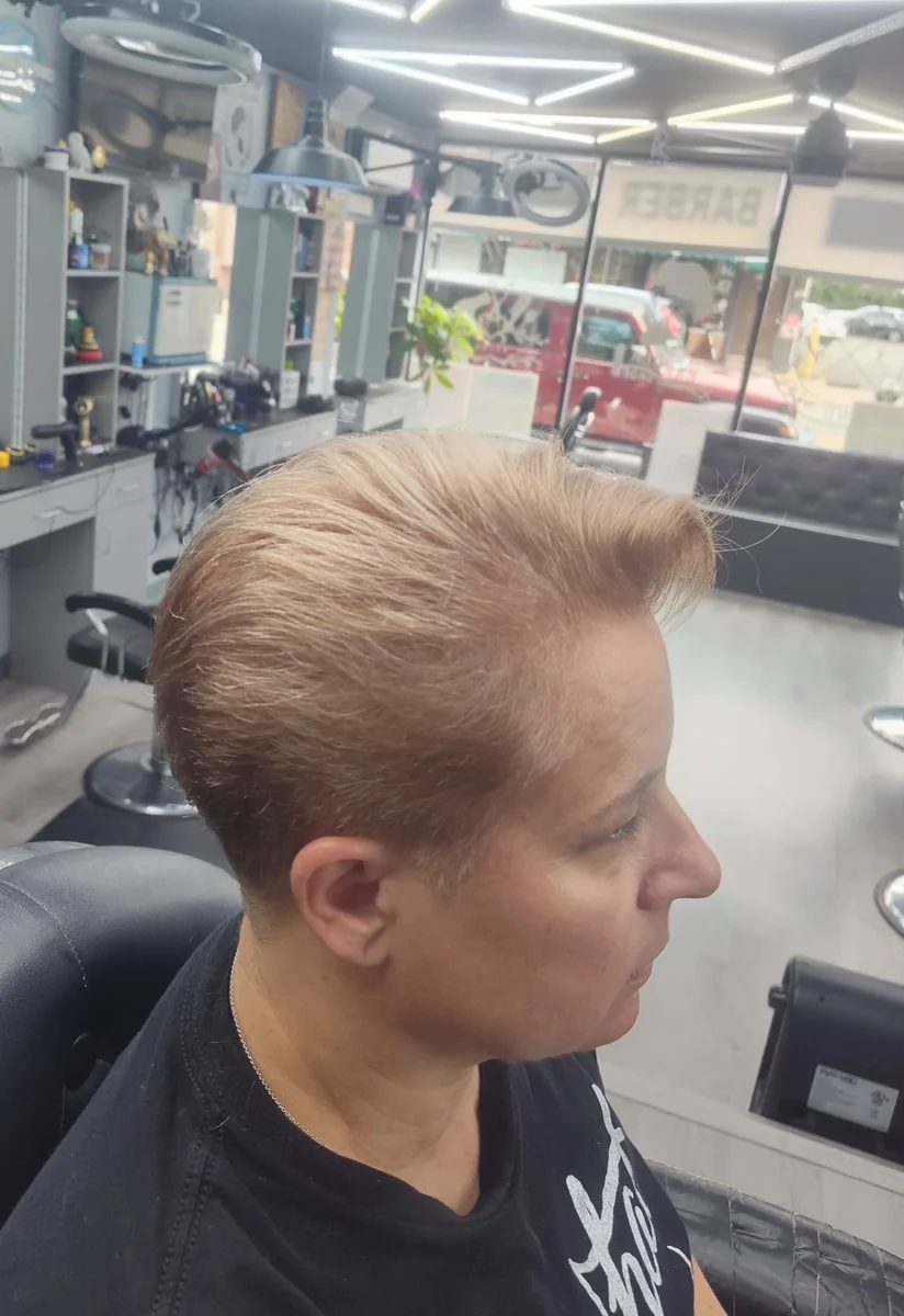 Short tapered cut in a light blonde tone
